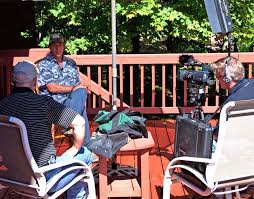 DDH TV producer Chris Hermans handles the camera during an interview with Ted Nugent for the show.