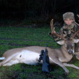 Tanner Hornback with his big buck, his first one ever.