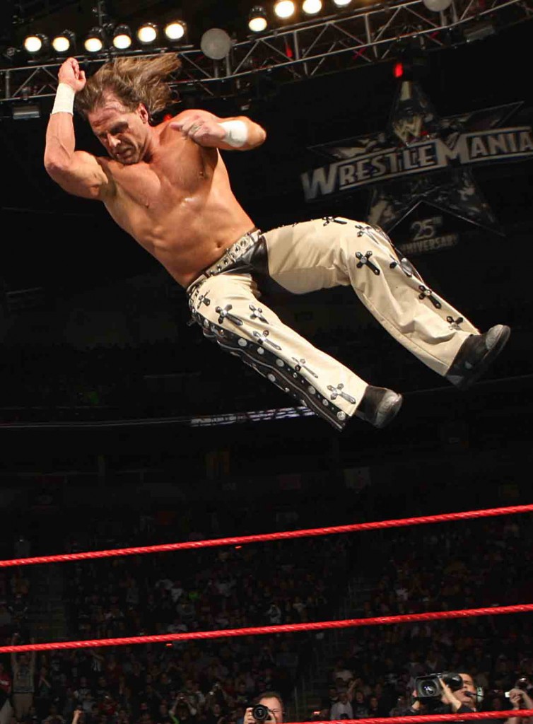 Shawn Michaels prepares to land with devastation during a WWE match. (Copyright Photo: WWE)