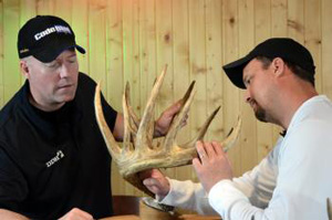 D&DH Editor Dan Schmidt (left) examines the rack.