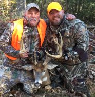 Proud papa Lenny III (left) with his son, who took down the Delaware giant.