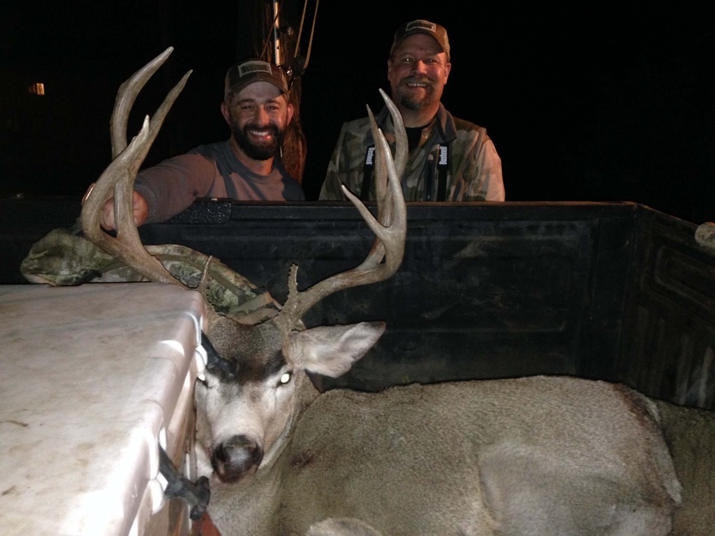 My buddy Lee Hoots from Arizona (right) was one of the first hunters to punch his tag. We all spent time around the skinning shed that night listening to him re-tell the story of how it all came together.