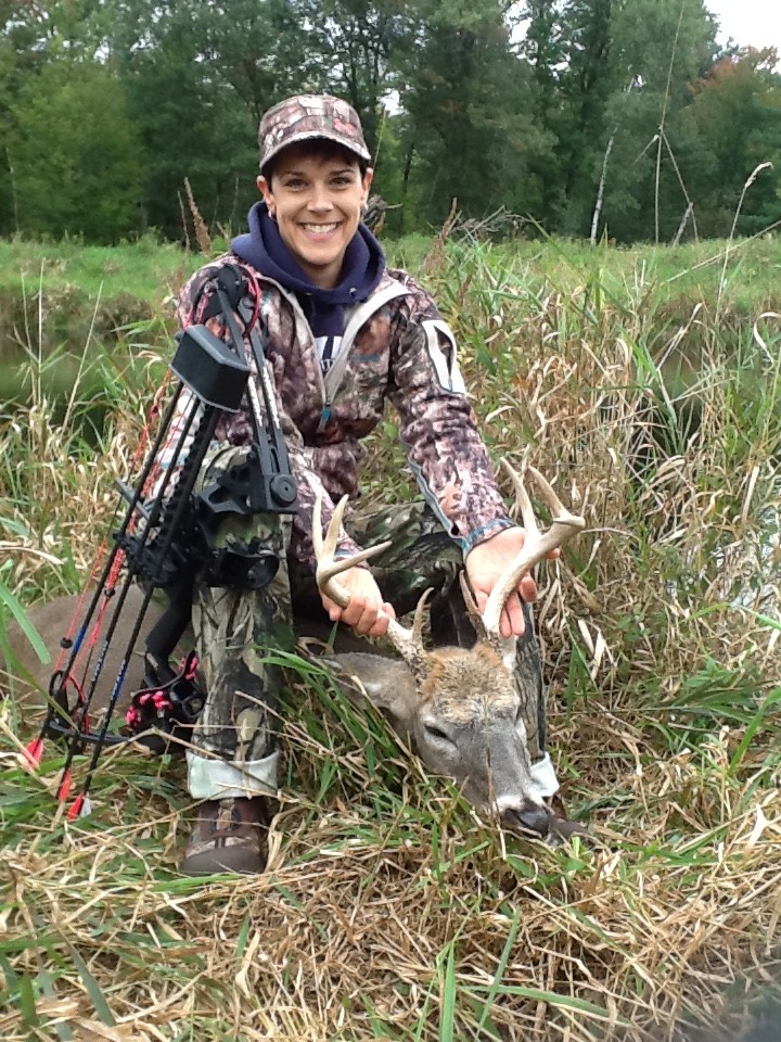 Holly Sherman is all smiles after recovering her first bow-buck earlier this week in central Wisconsin. (photo courtesy of Lon Sherman)