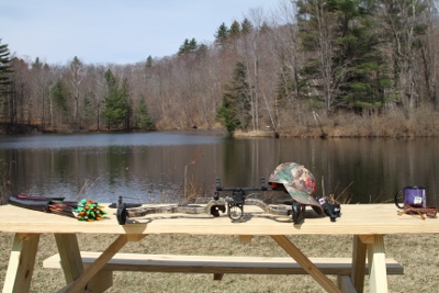 New office location complete with morning archery practice.