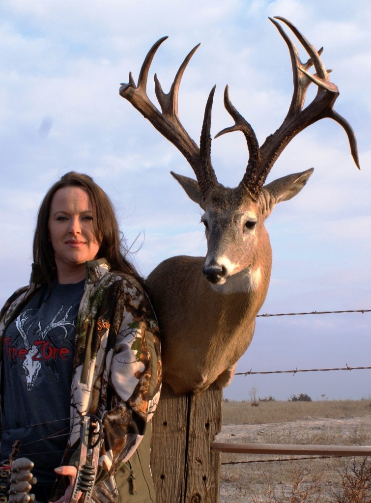 Linet Navarro of Oklahoma with her monster non-typical buck that scored 175 net.