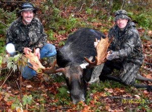 Rick Giguere, left, and Dave Redfield with Giguere's 48.75-inch bull from the 2010 season.
