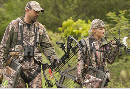 Whether you're hunting, hanging stands or moving them around, always remember to wear a safety harness, stay hooked up, and let someone know where you'll be. Safety first! (Photo: Summit Stands)