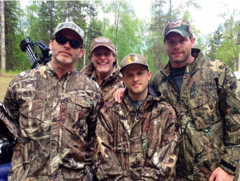 Ted with his sons, enjoying the outdoors and hunting life.