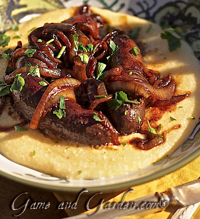 Venison Sausage over Cheesy Grits